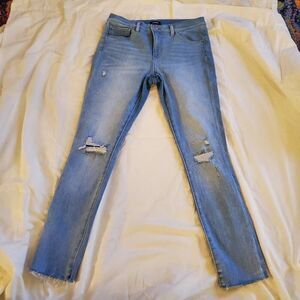 Express light blue skinny ankle distressed midrise raw hem jean 10 long